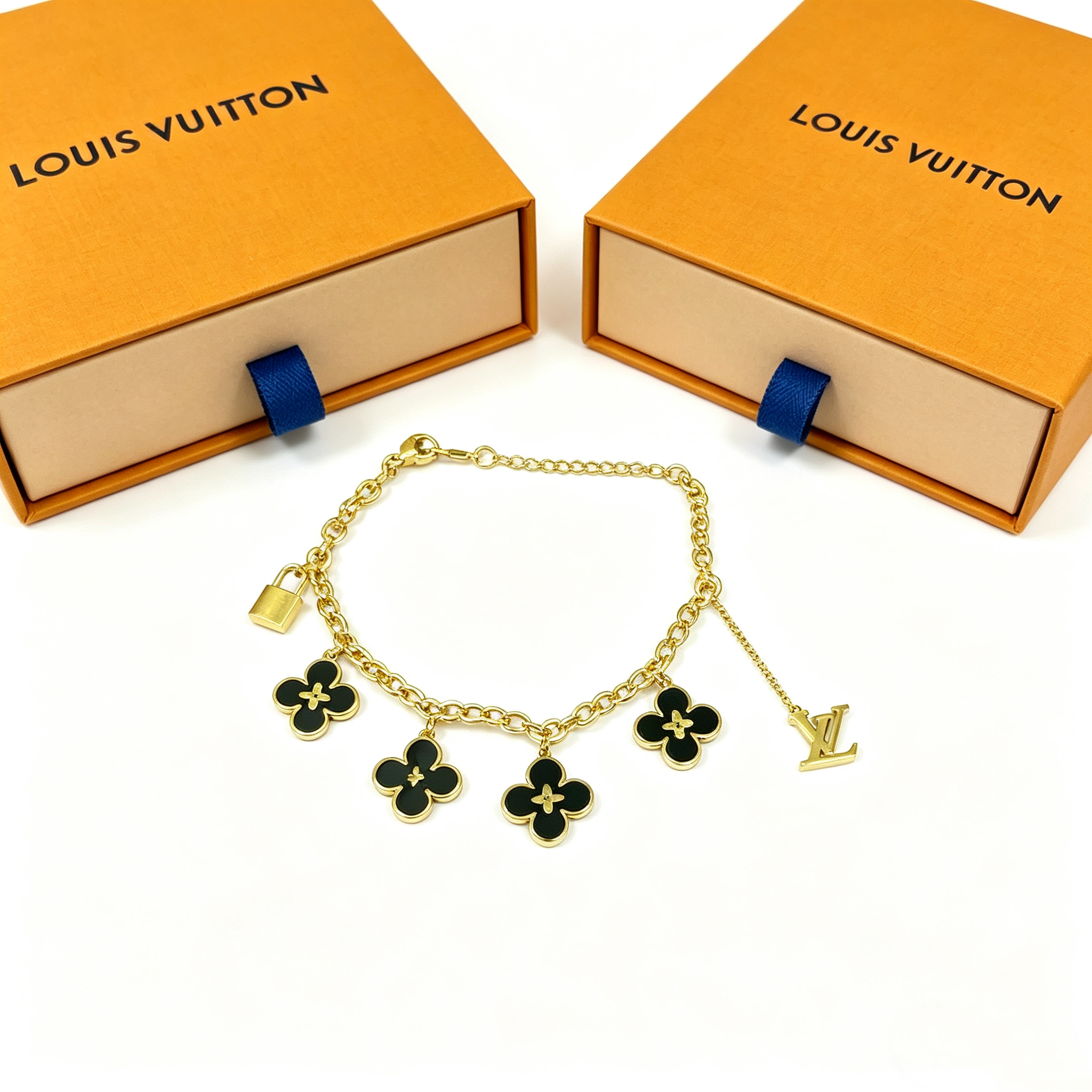 L — Metal Bracelet with Four-Flower Pendant