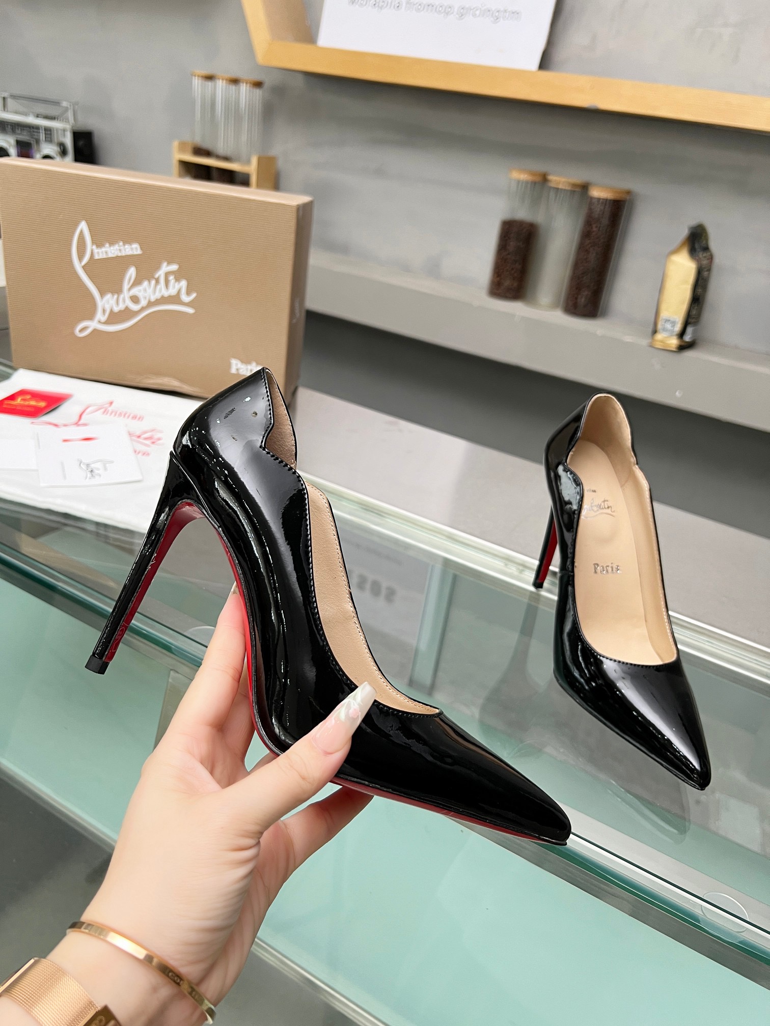 Christian Louboutin CL red soled shoes