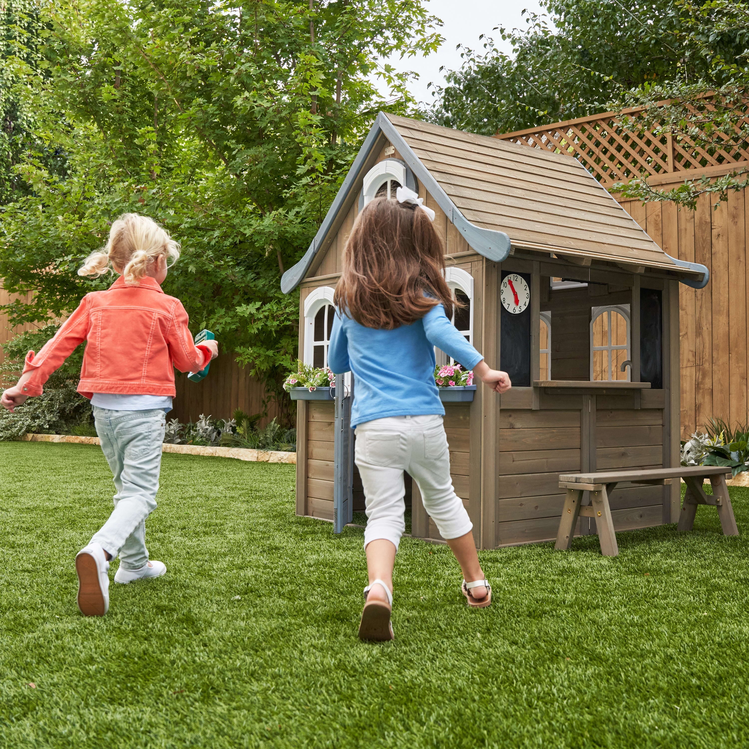 KidKraft Forestview II Wooden Outdoor Playhouse with Ringing Doorbell, Bench and Kitchen