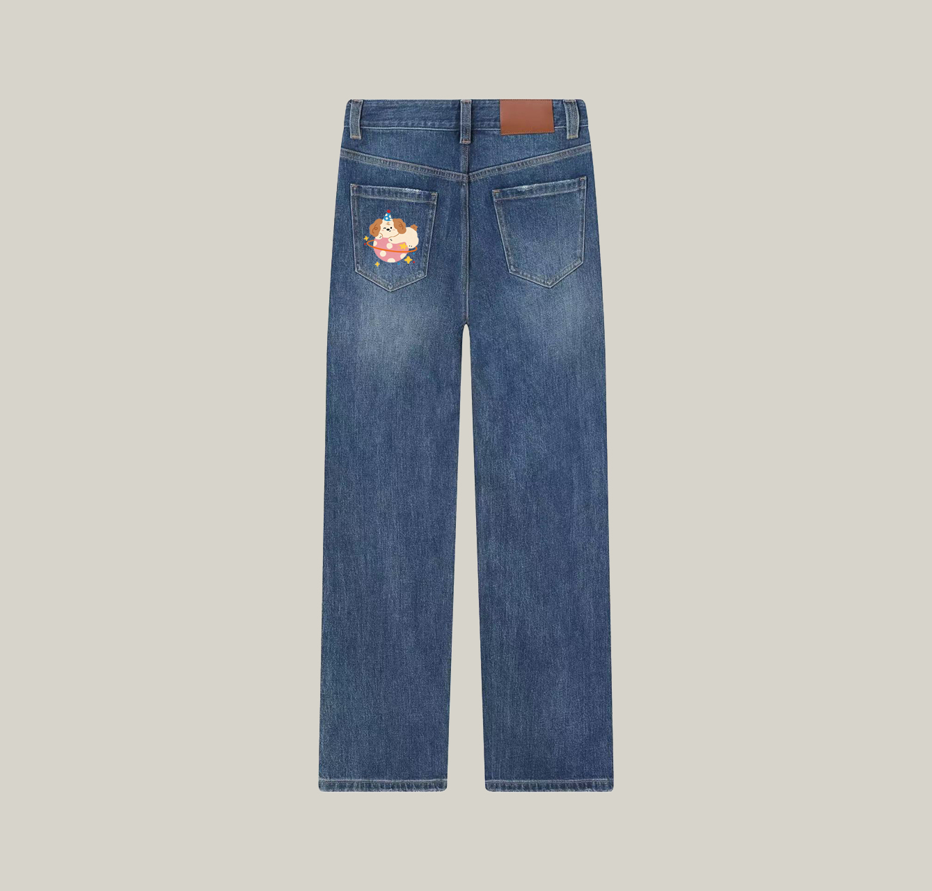 A pair of jeans featuring a puppy print—an essential item for your summer wardrobe.