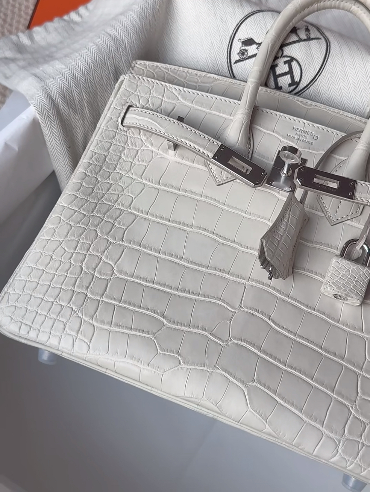 Hermès 25-35 crocodile leather glacier white