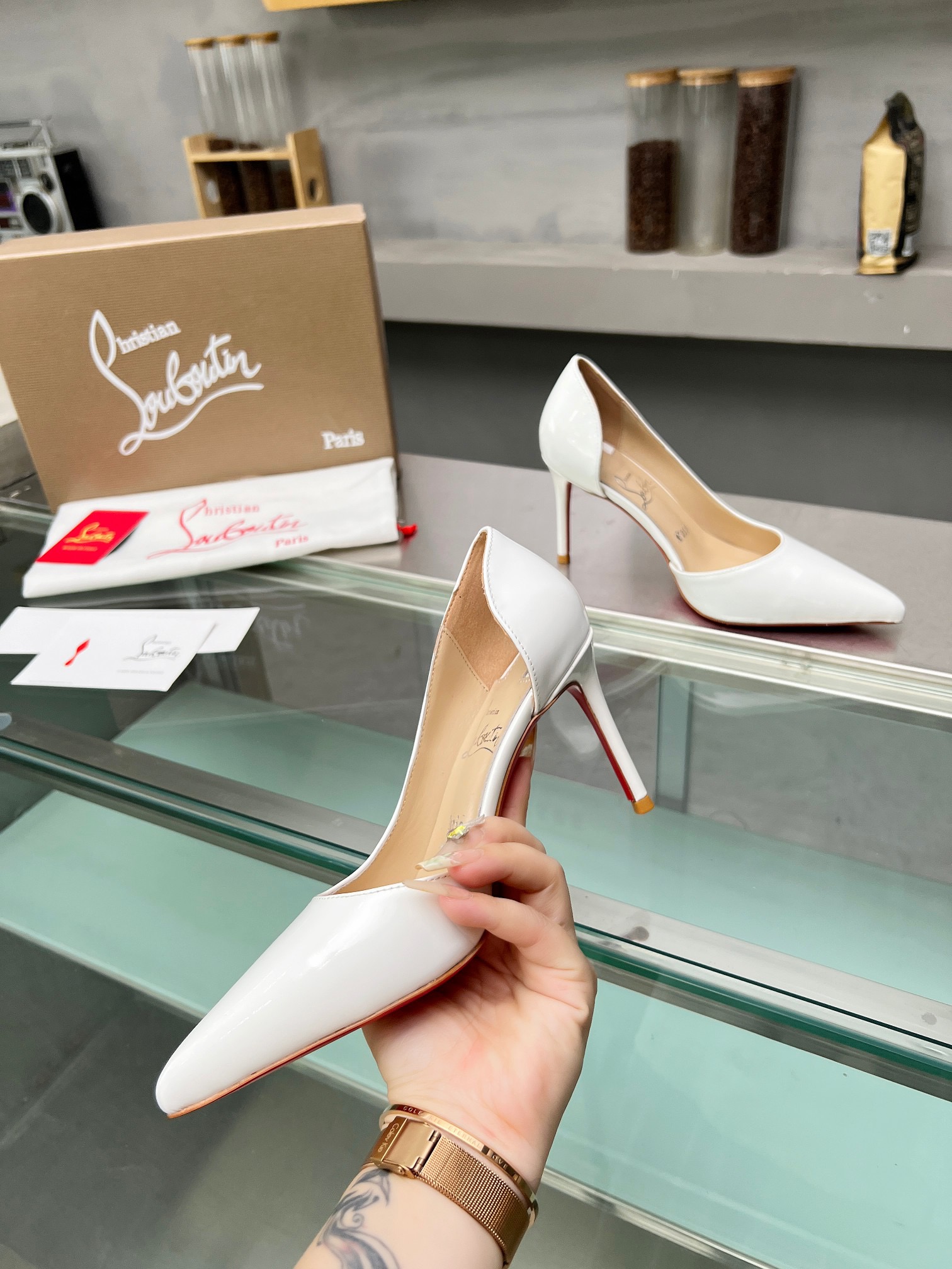 Christian Louboutin CL red soled shoes
