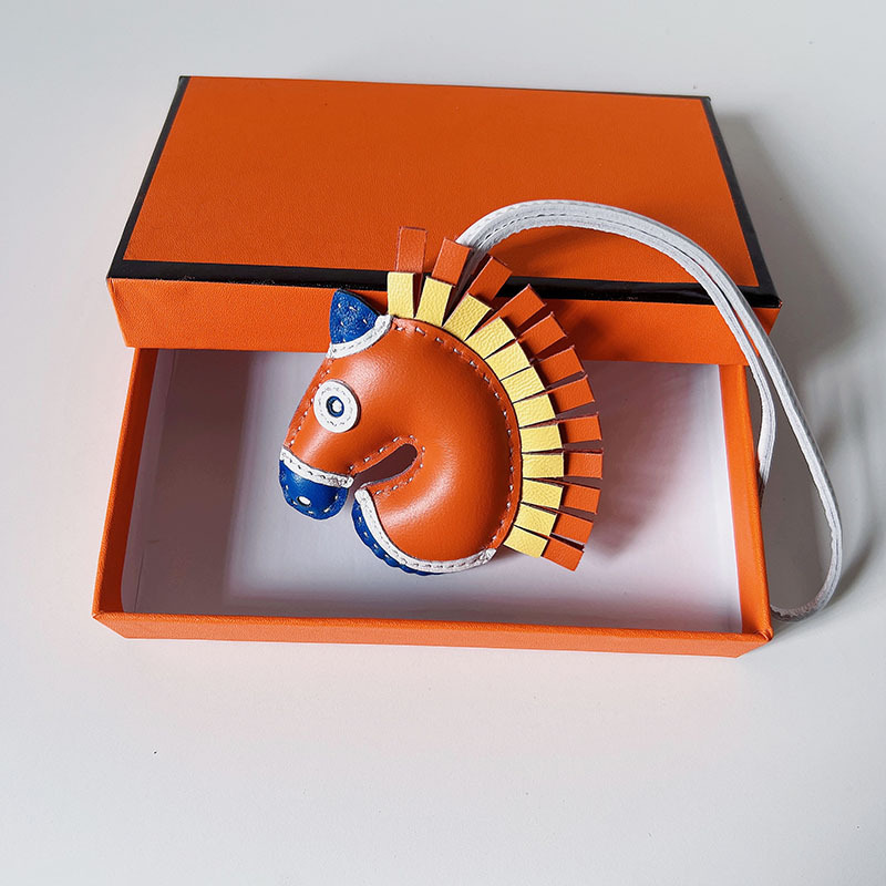 Handsewn unicorn pendant