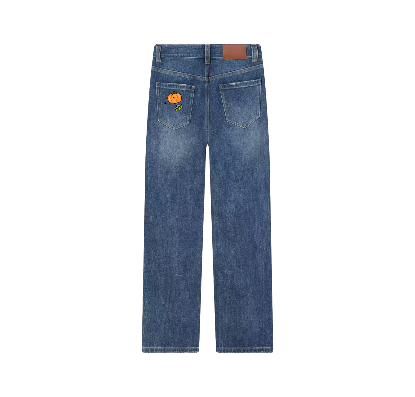 A pair of jeans with a giant pumpkin print—a wardrobe essential.