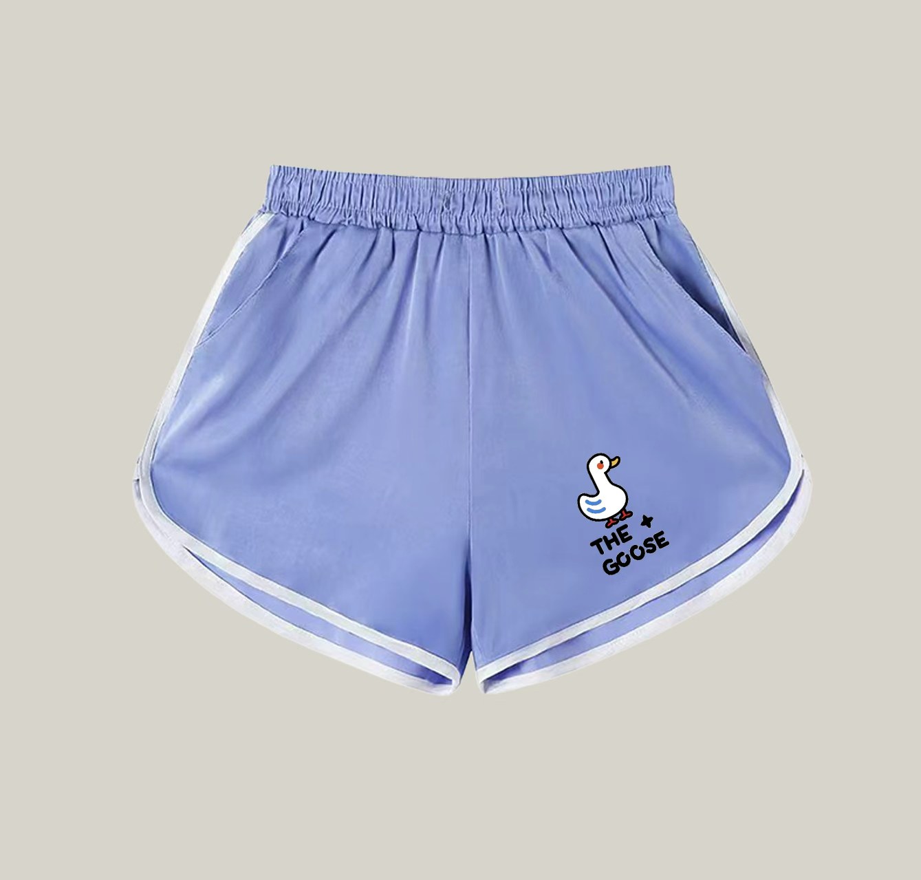 A pair of athletic shorts with a big white goose pattern—a wardrobe essential.