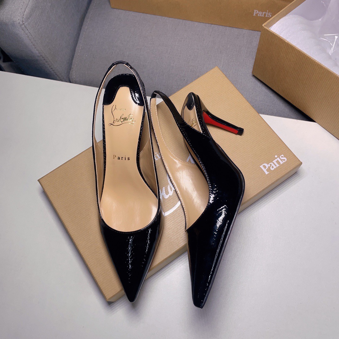 Christian Louboutin CL red soled shoes