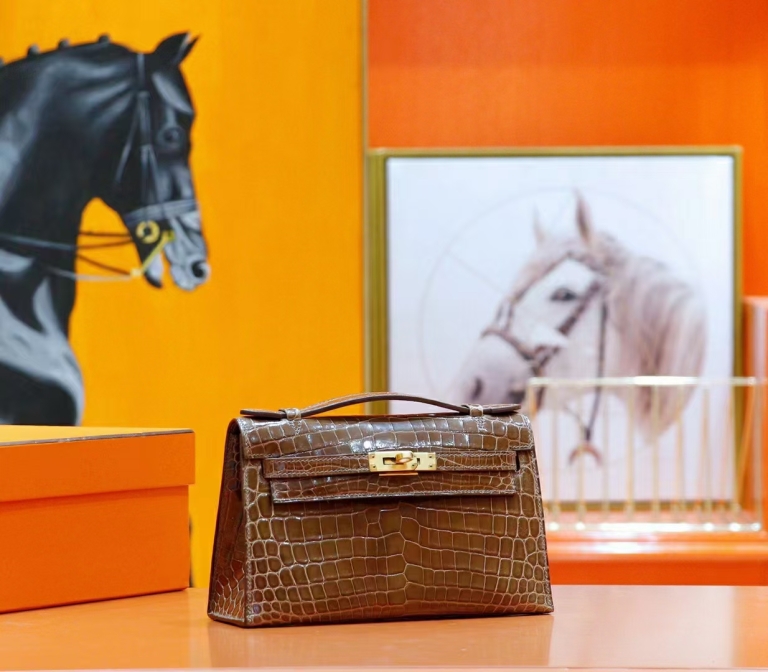 Hermes Mini Kelly Mini Kelly in smoky grey shiny crocodile skin gold buckle  22cm long