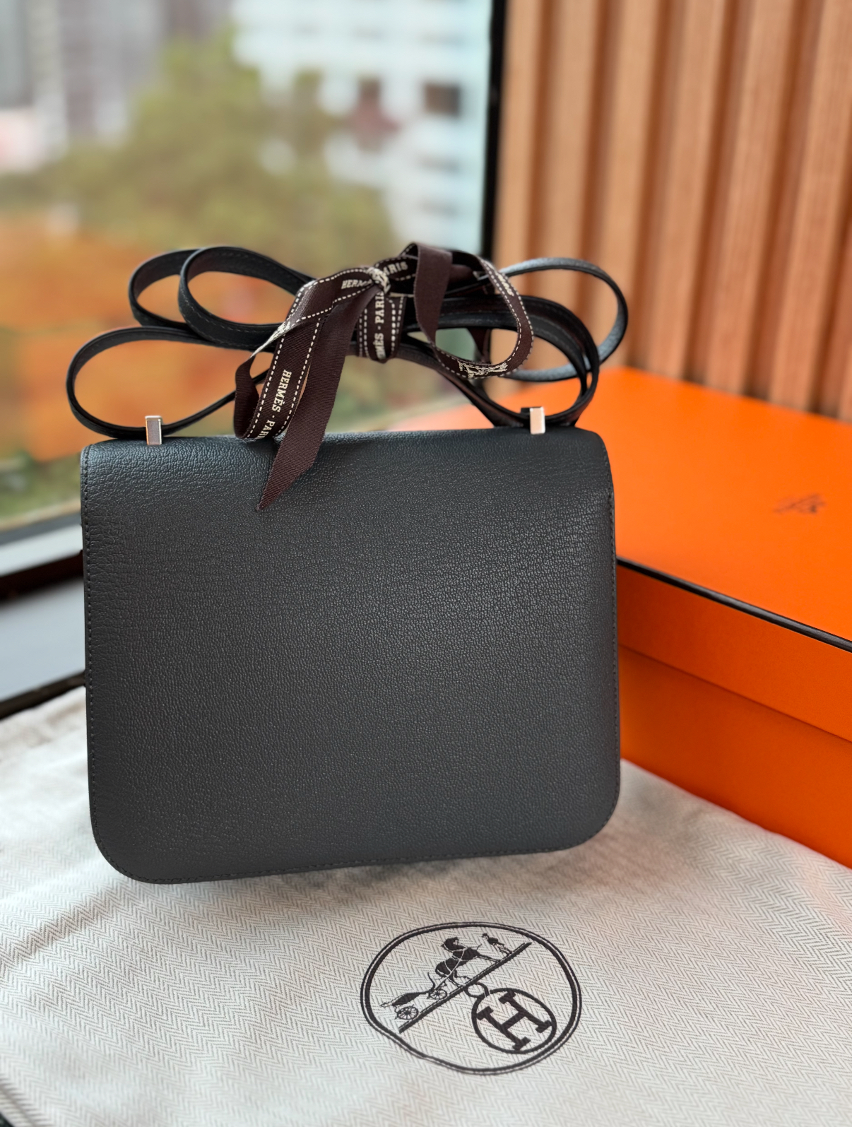 Hermes Handcrafted by masters Mini constance CK3T Carbon grey goatskin with silver buckle and K engraving