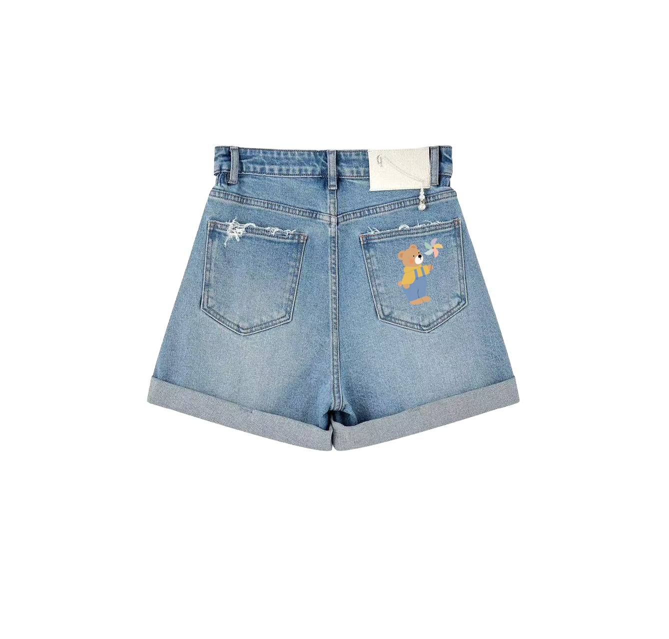 A pair of denim shorts with a bear holding a windmill printed on them is a must-have item in your summer wardrobe.