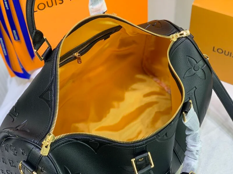Louis Vuitton Empreinte Leather Keepall Bandouliere 45