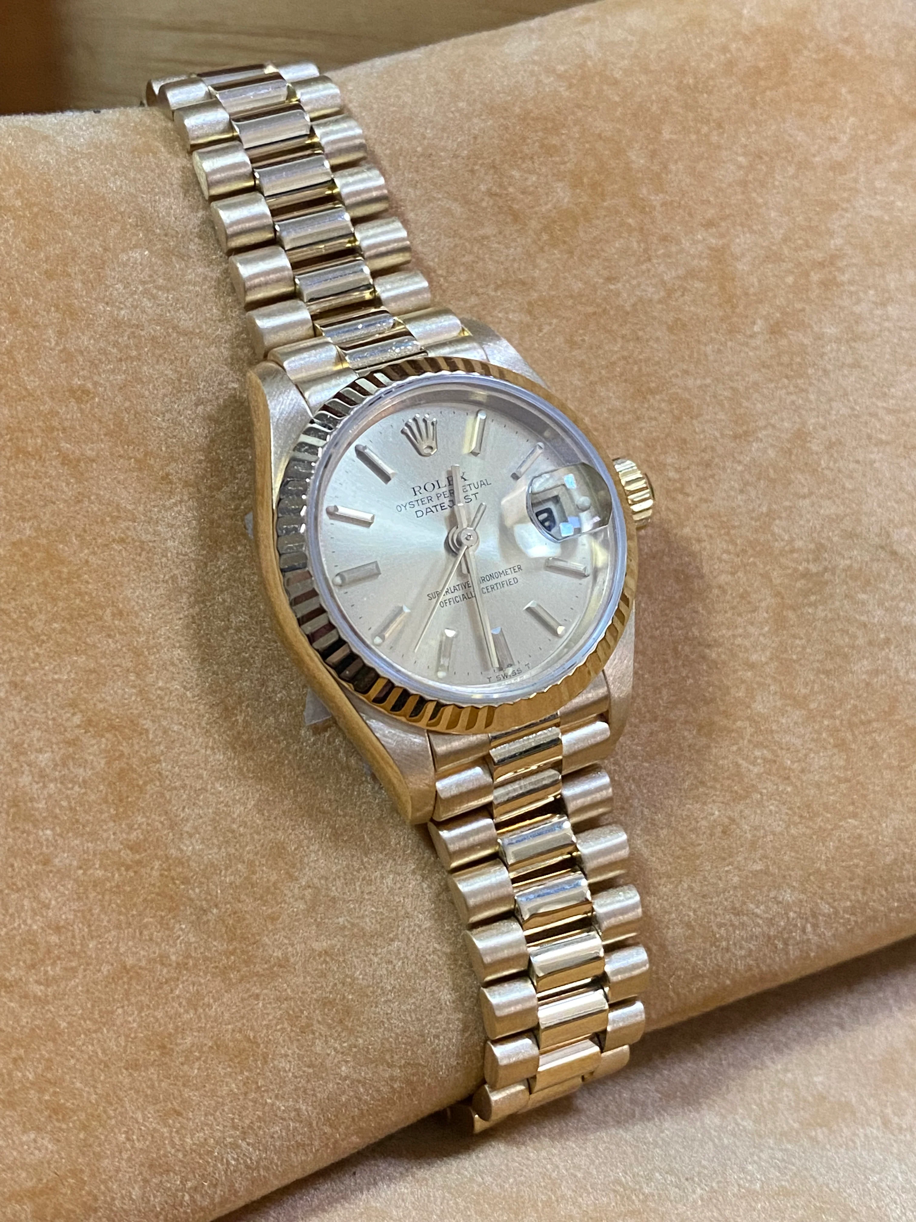 Rolex Yellow Gold Lady-Datejust 26 - W Serial - Fluted Bezel - Champagne Index Dial - President Bracelet - 69178