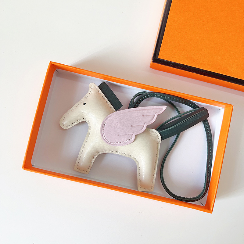 H Hand sewn pony pendant