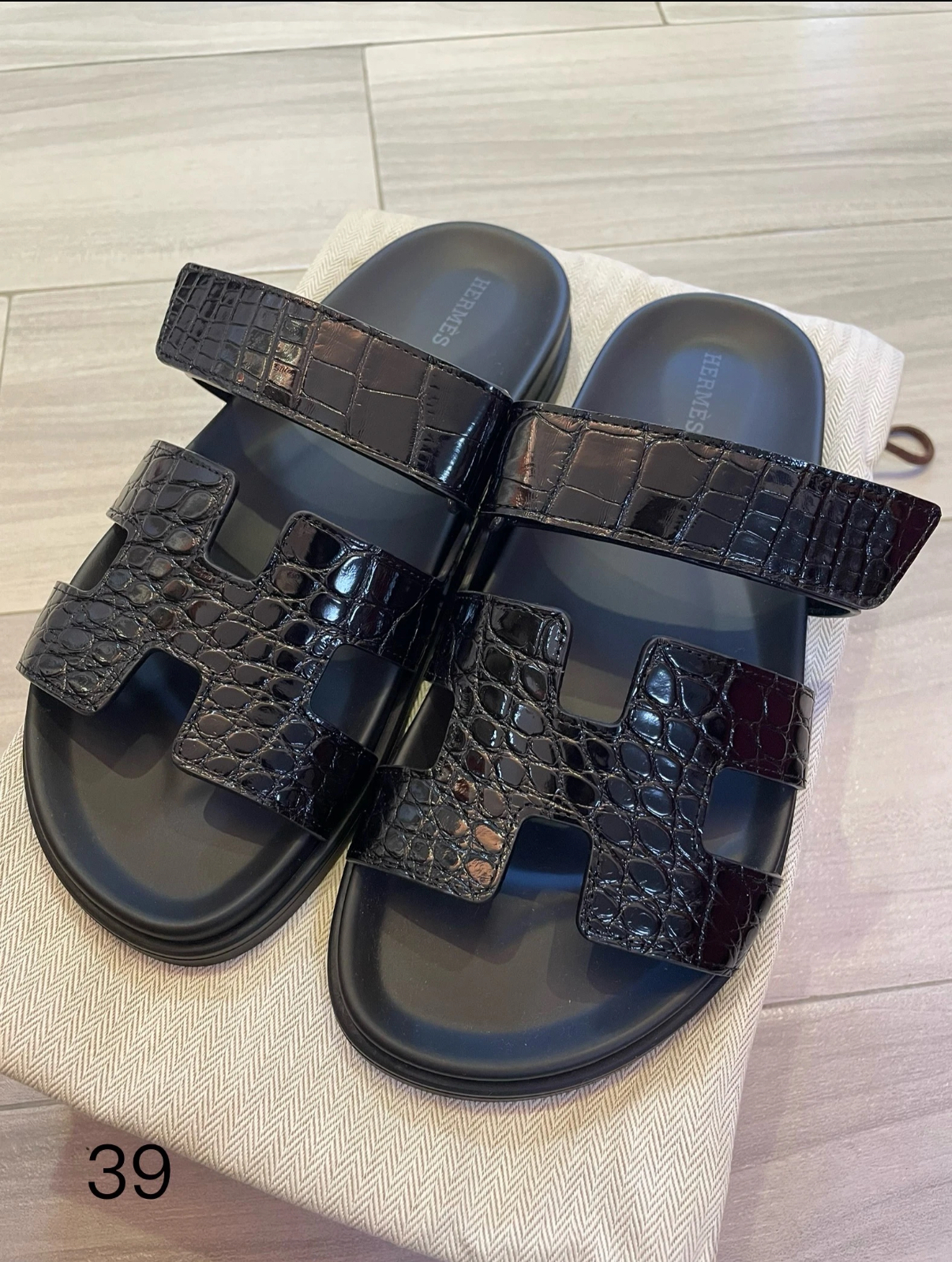 Hermès black crocodile leather slippers