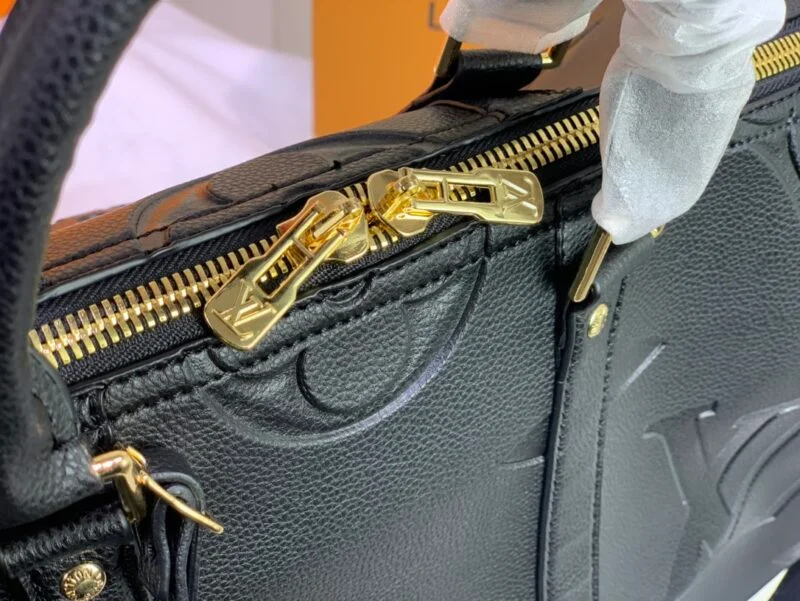 Louis Vuitton Empreinte Leather Keepall Bandouliere 45