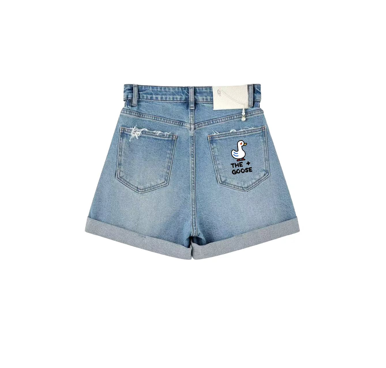 A pair of denim shorts with a white goose print is a must-have item in your summer wardrobe.