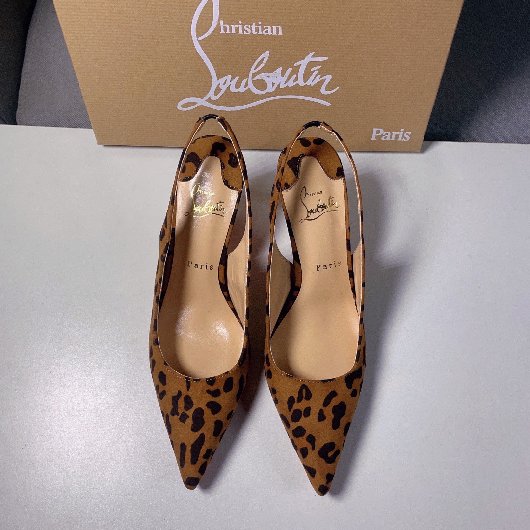 Christian Louboutin CL red soled shoes