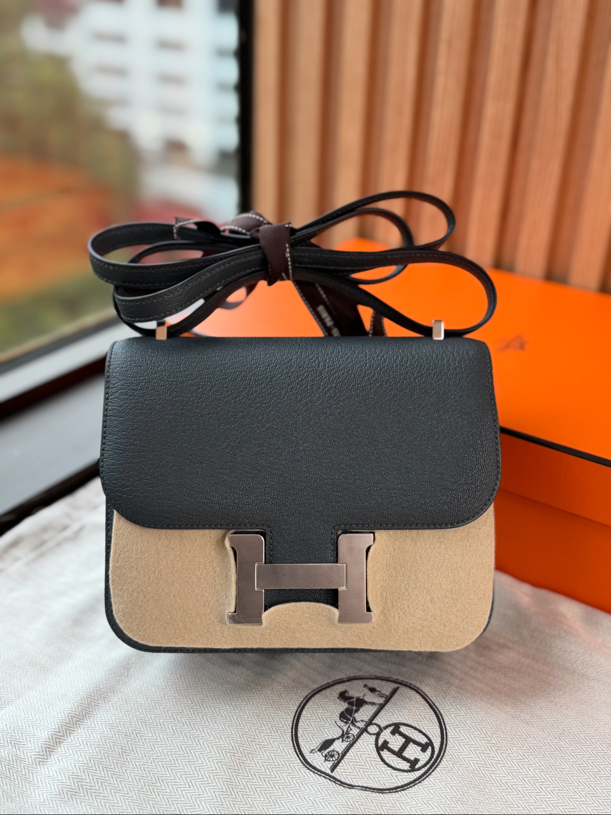 Hermes Handcrafted by masters Mini constance CK3T Carbon grey goatskin with silver buckle and K engraving