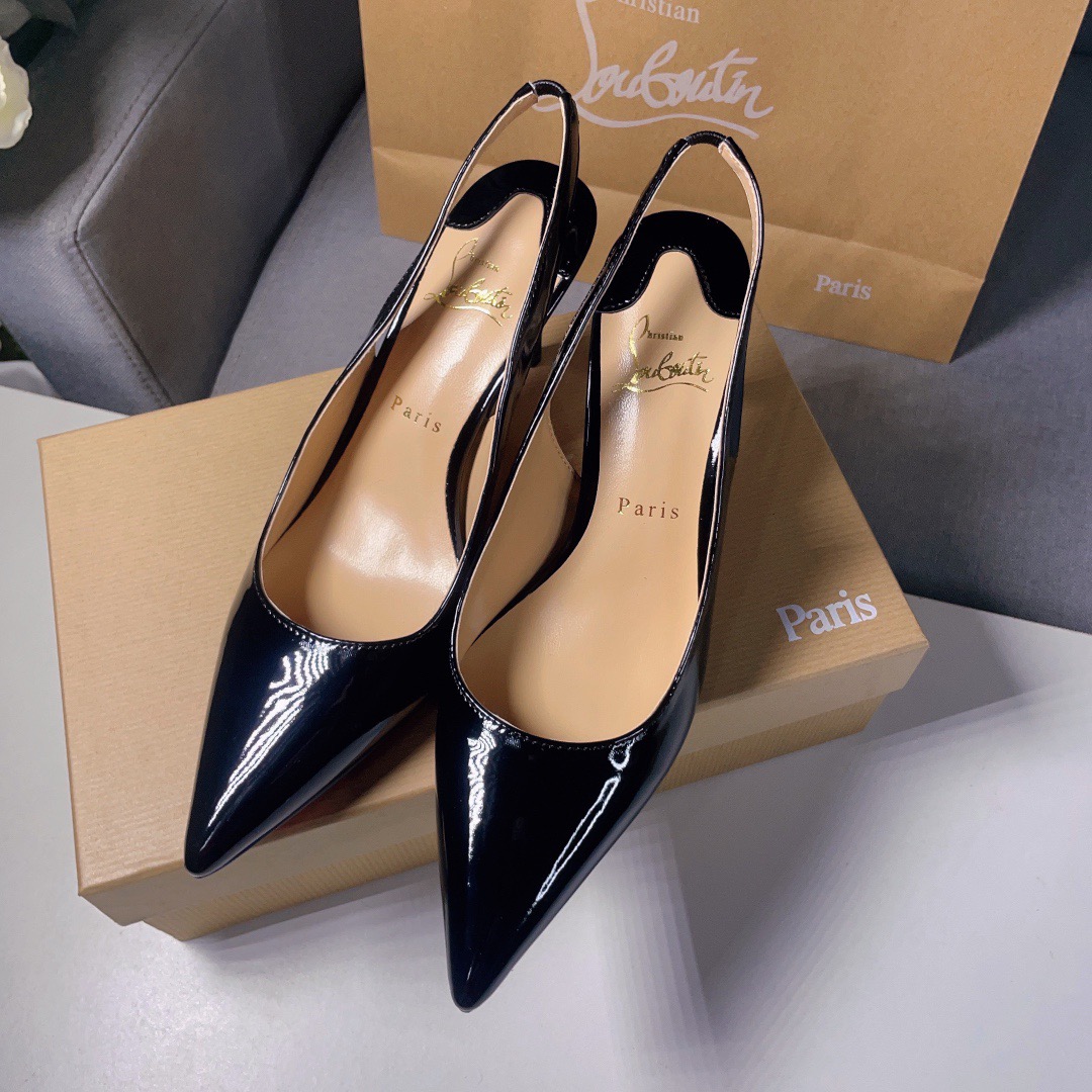 Christian Louboutin CL red soled shoes