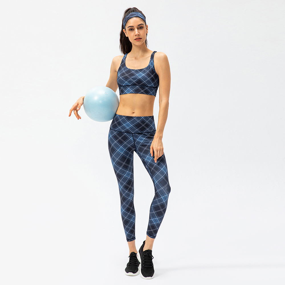 Women's houndstooth yoga pants, high-waisted, form-fitting, peach-shaped, running/sports pants with a checkered pattern.
