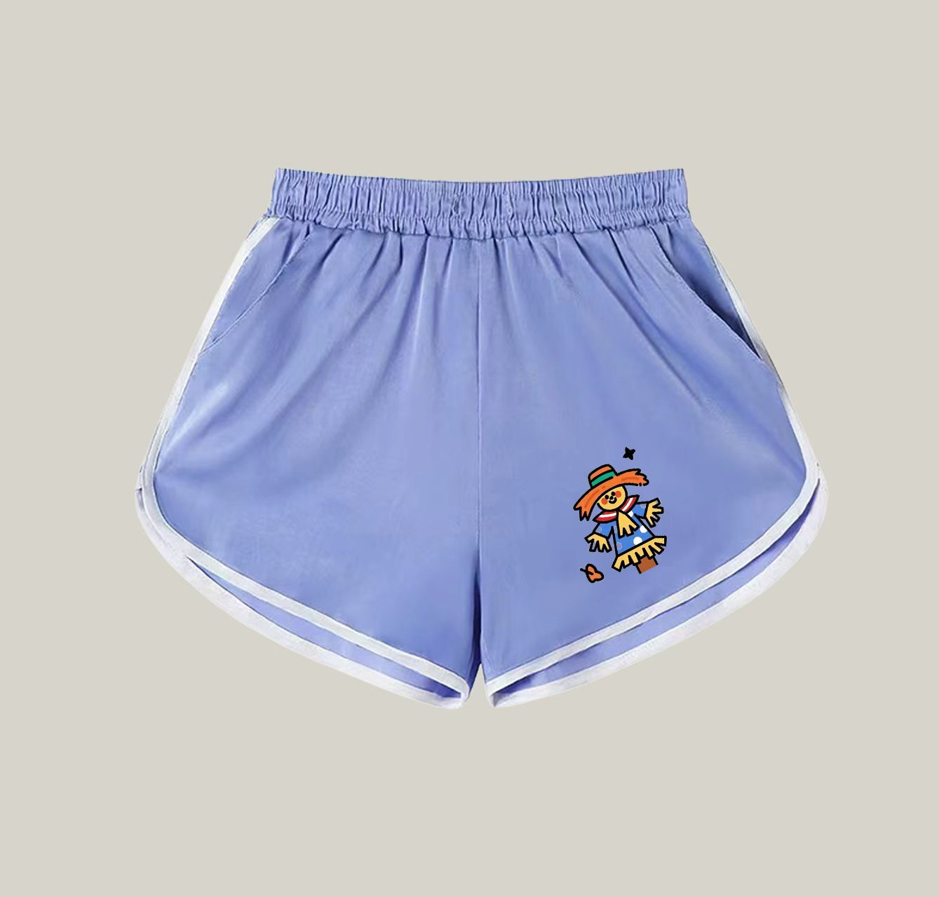 A pair of athletic shorts with a scarecrow pattern—a wardrobe essential.
