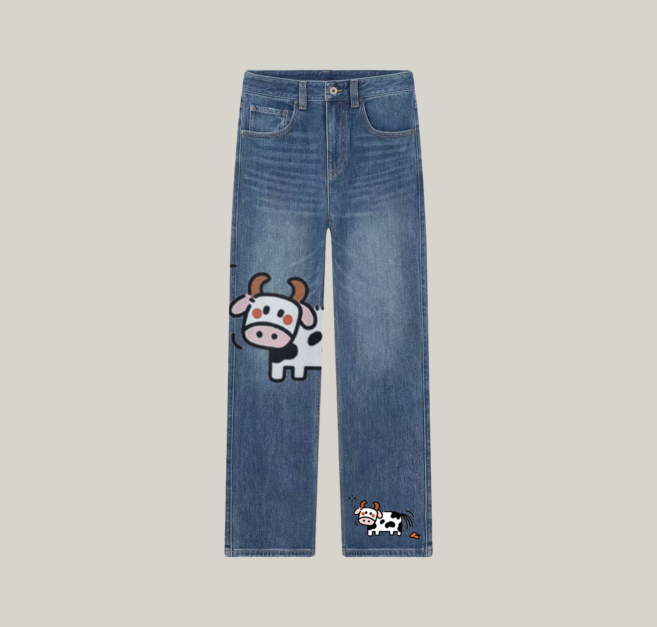 A pair of jeans with a cow print—a wardrobe essential.