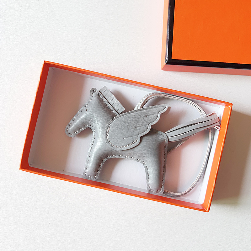 H Hand sewn pony pendant