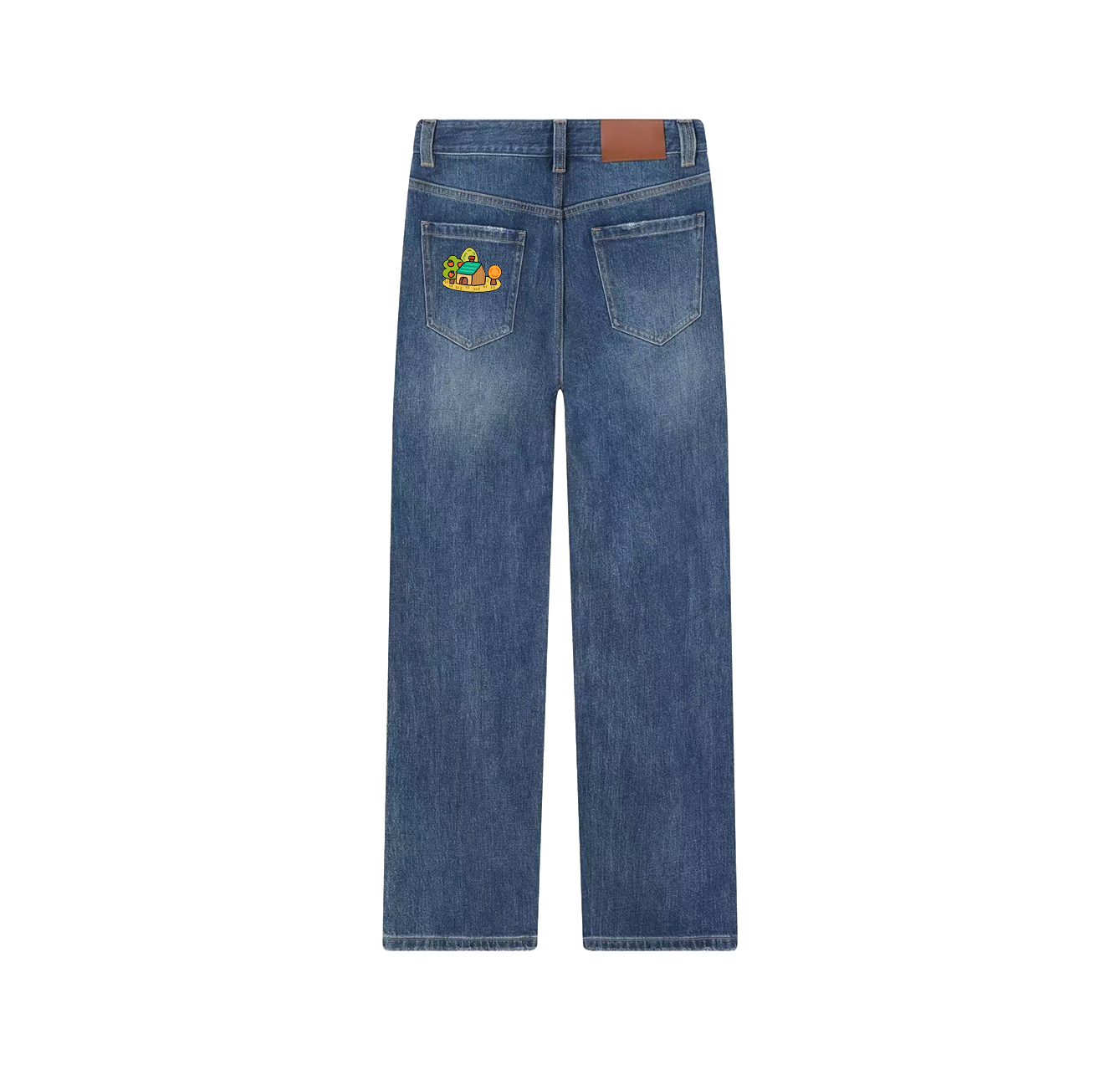 A pair of jeans featuring a house surrounded by trees—a wardrobe essential.