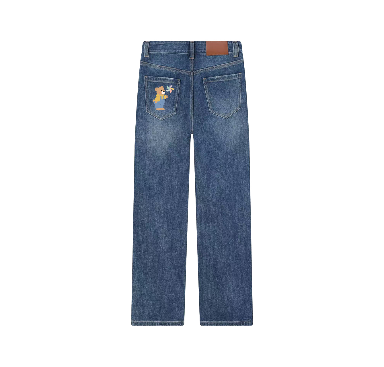 A pair of jeans with a bear holding a windmill printed on them—a wardrobe essential.