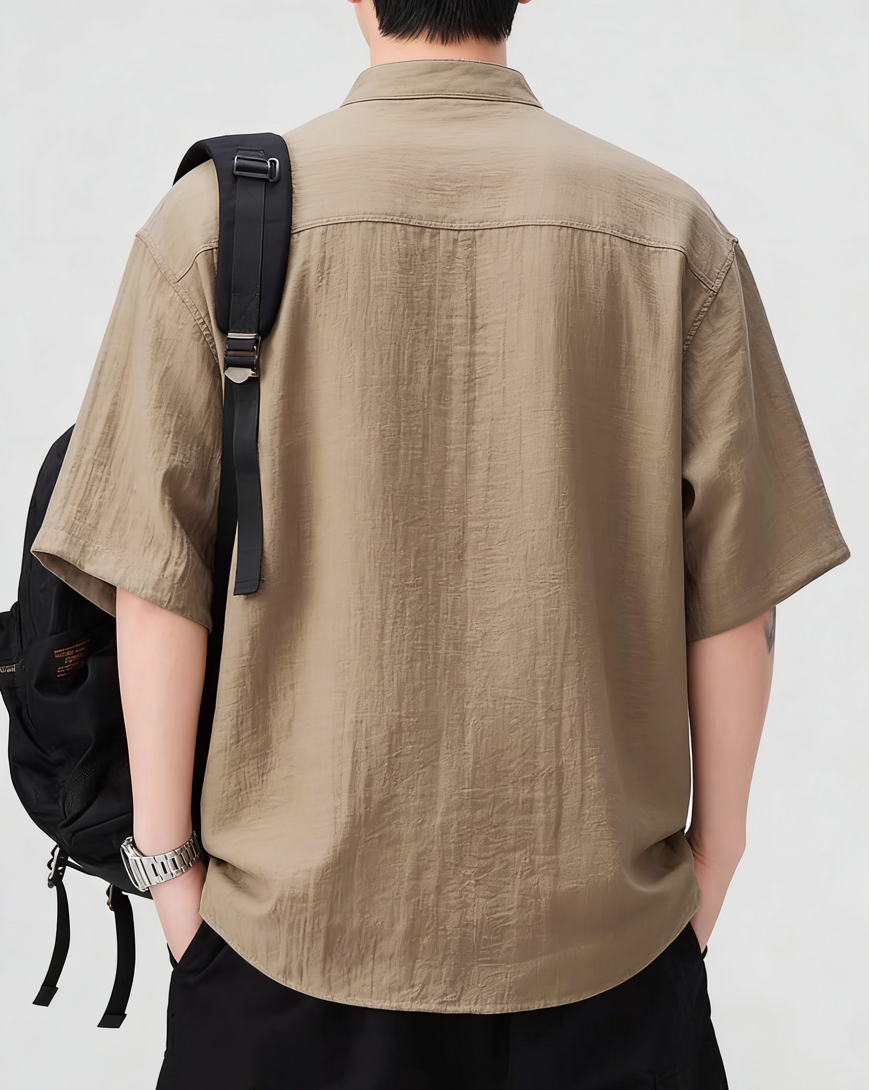 Men's relaxed cotton-linen stand-up collar short-sleeved shirt for summer, suitable for both work and leisure.