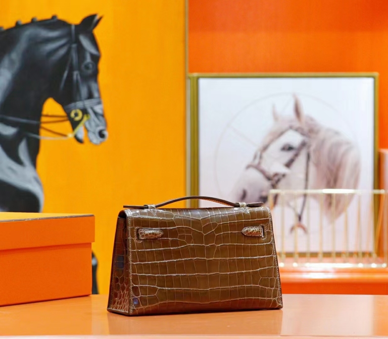 Hermes Mini Kelly Mini Kelly in smoky grey shiny crocodile skin gold buckle  22cm long