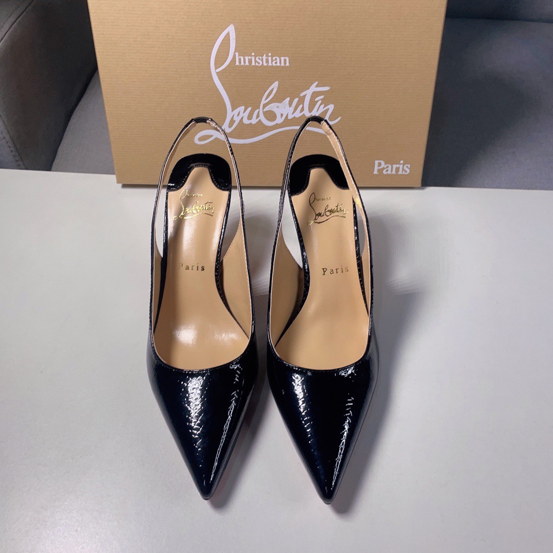 Christian Louboutin CL red soled shoes