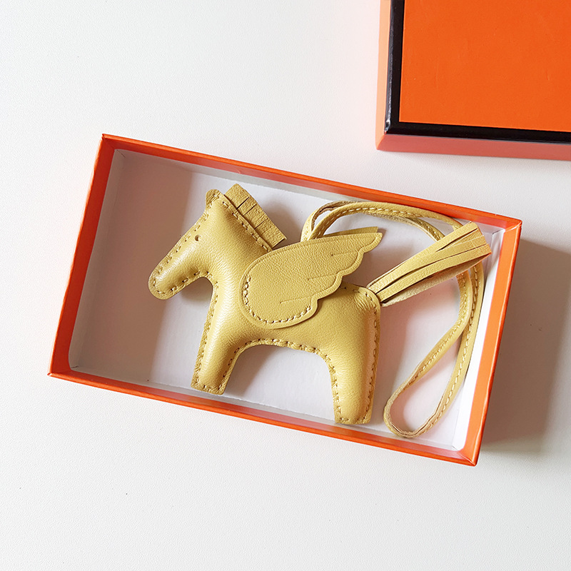 H Hand sewn pony pendant