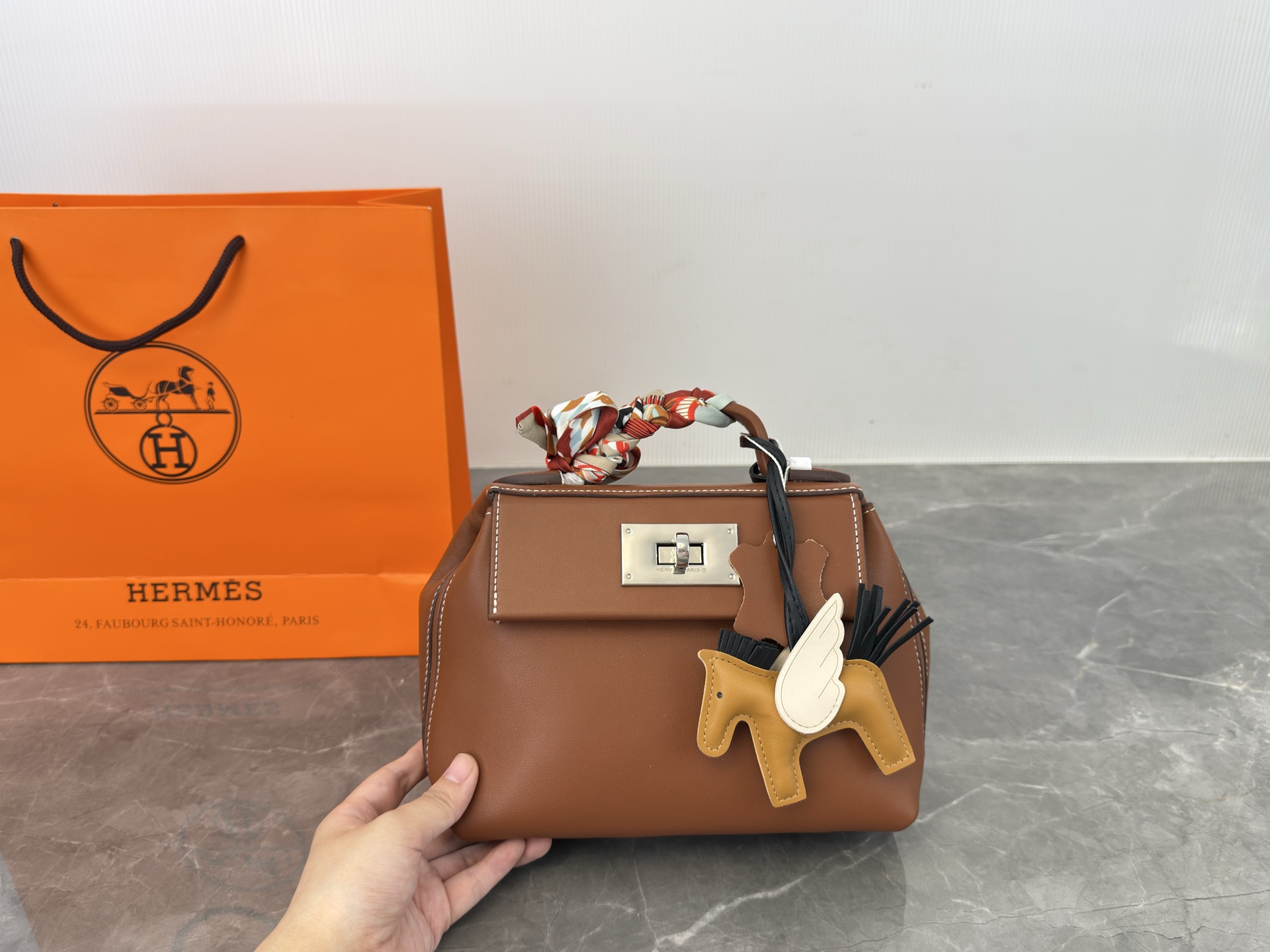 Hermès mini 2424 handbag/shoulder bag