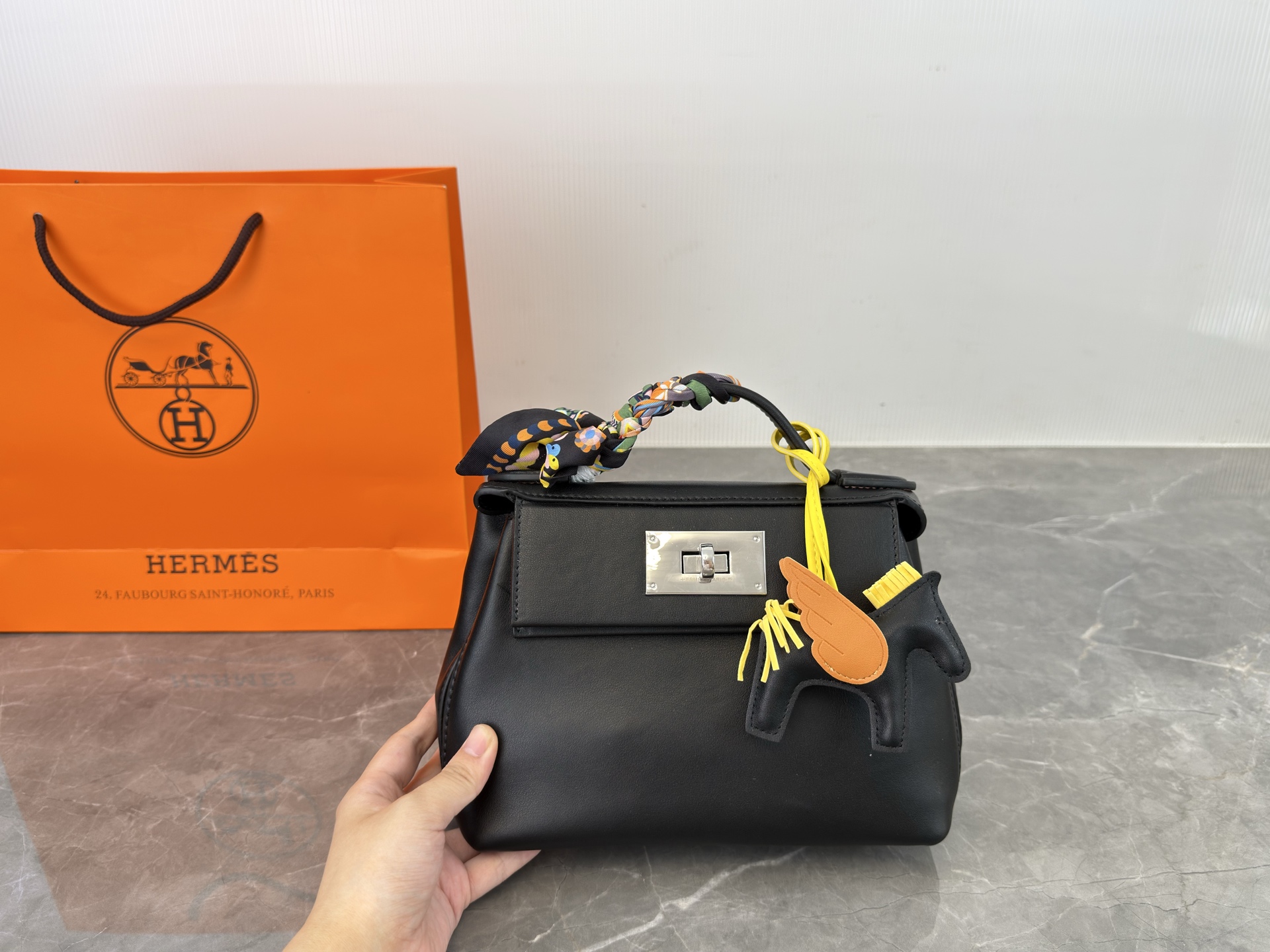 Hermès mini 2424 handbag/shoulder bag