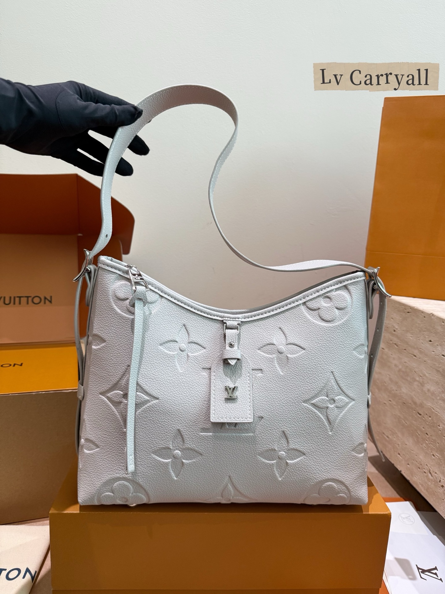Louis Vuitton Carryall crossbody bag