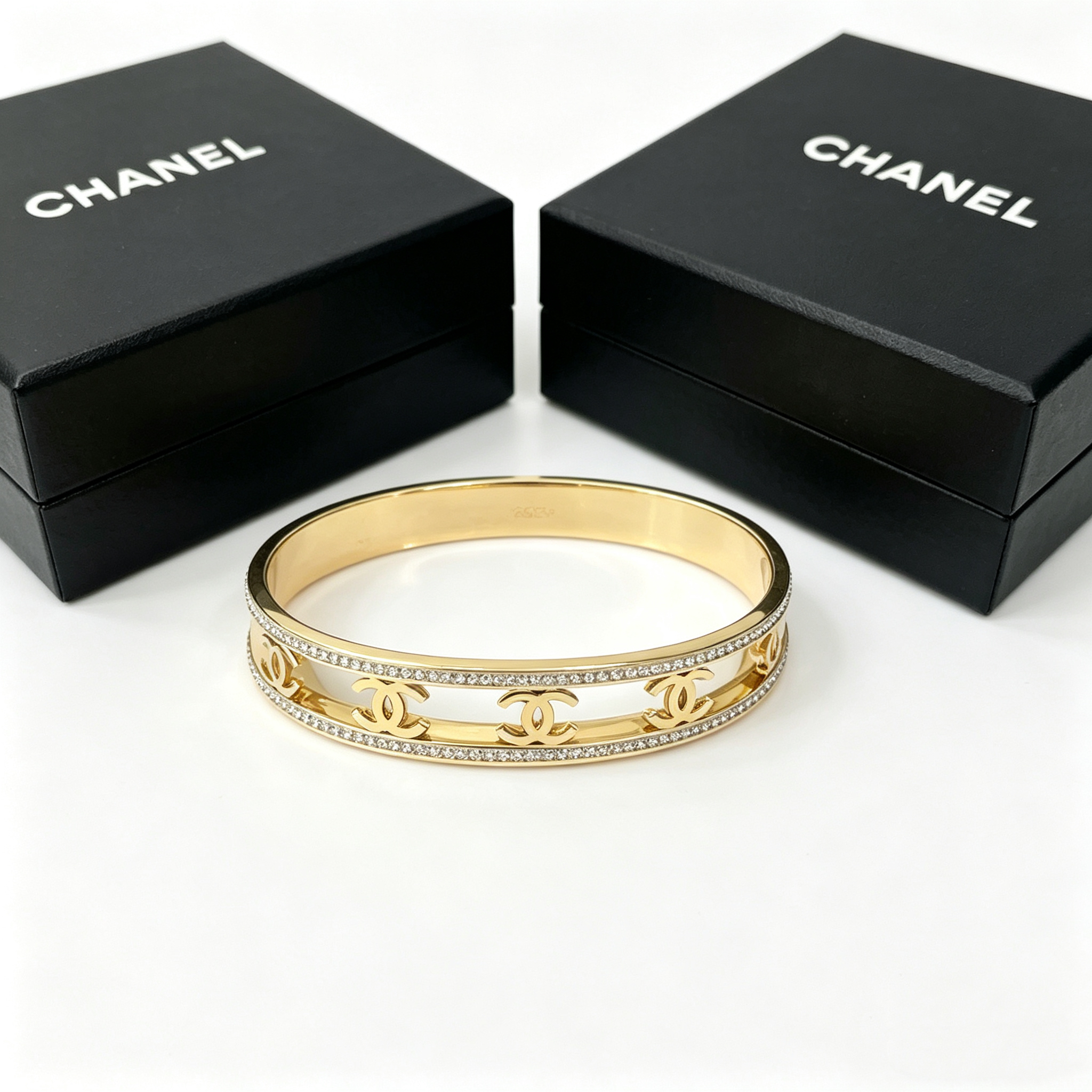 C—Hollowed-out Logo Metal Bangle