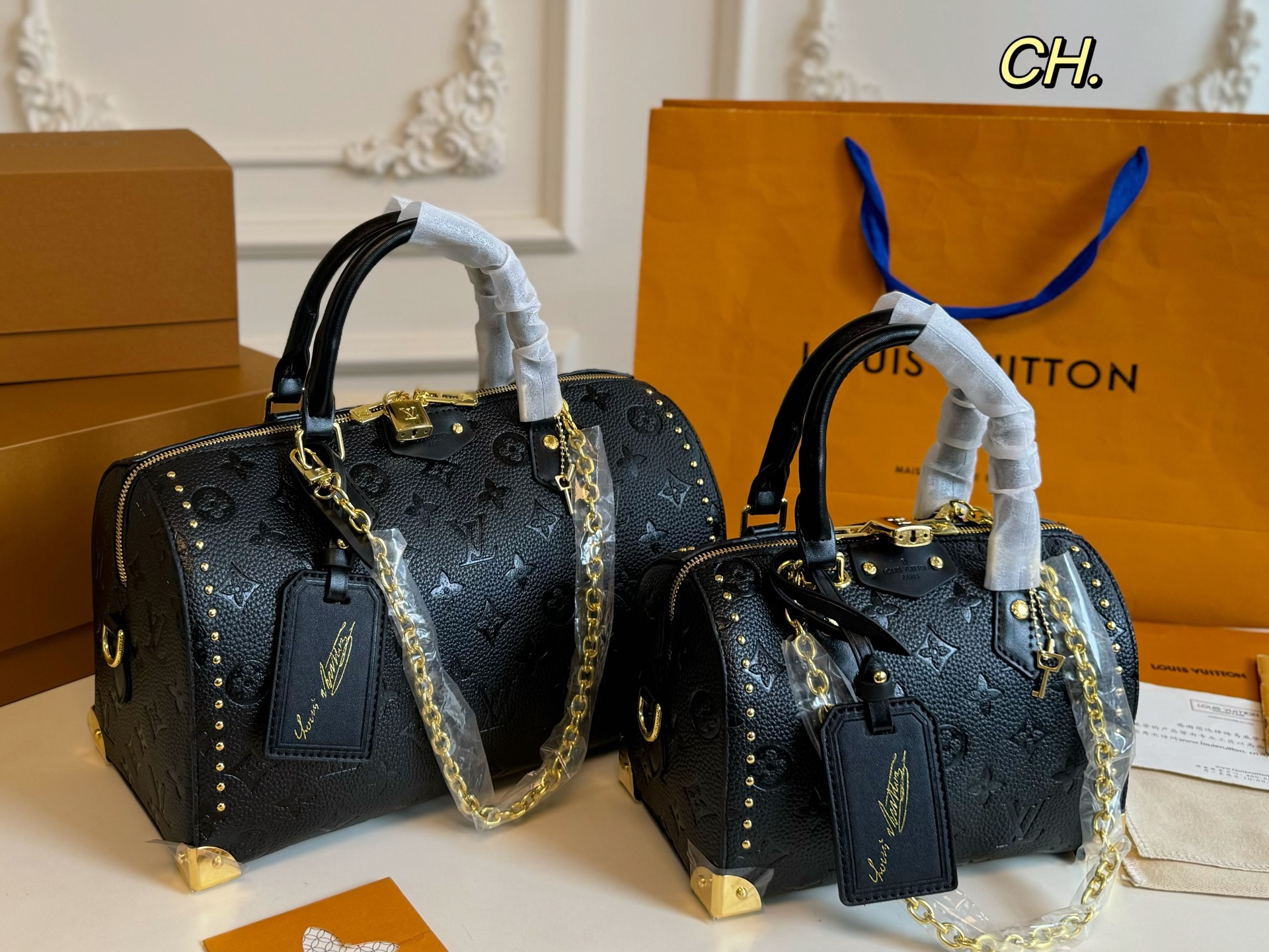 Louis Vuitton studded Speedy Boston pillow bag
