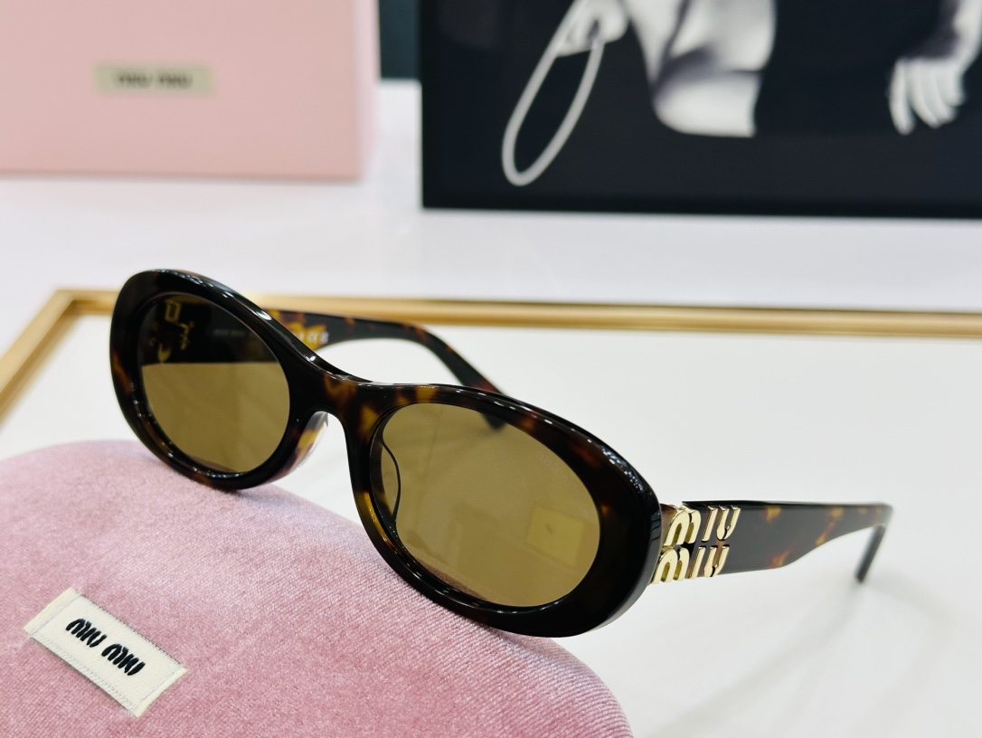 Miu Miu Sunglasses SMU06Z SM021