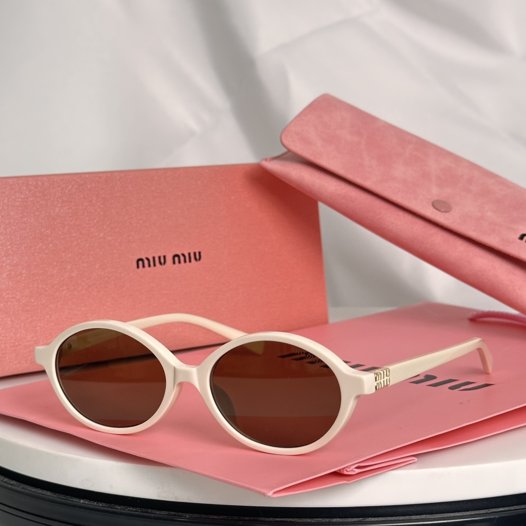 Miu Miu Sunglasses SMU04Z SM011