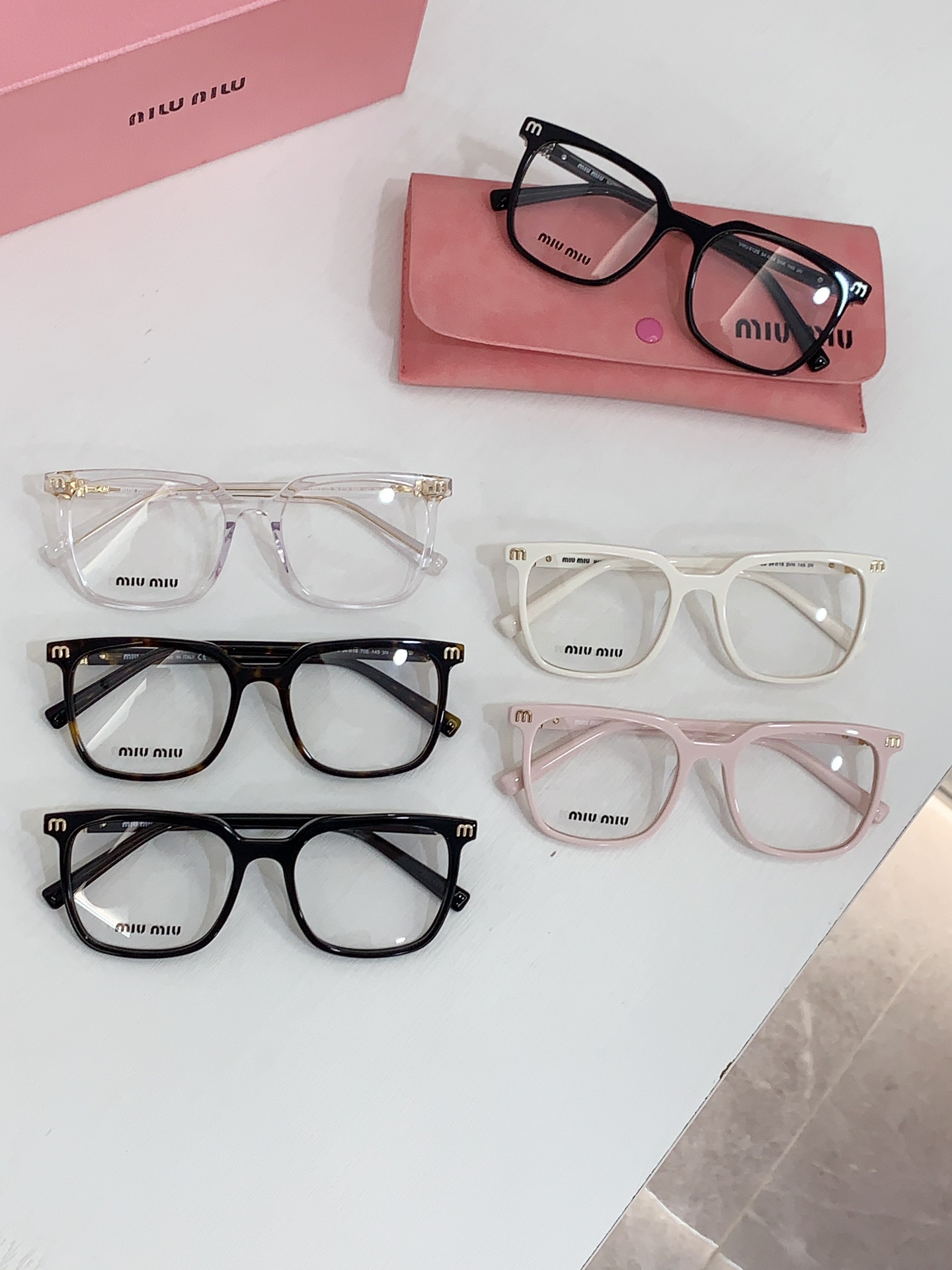 Miu Miu Sunglasses VMU61ZS SM041