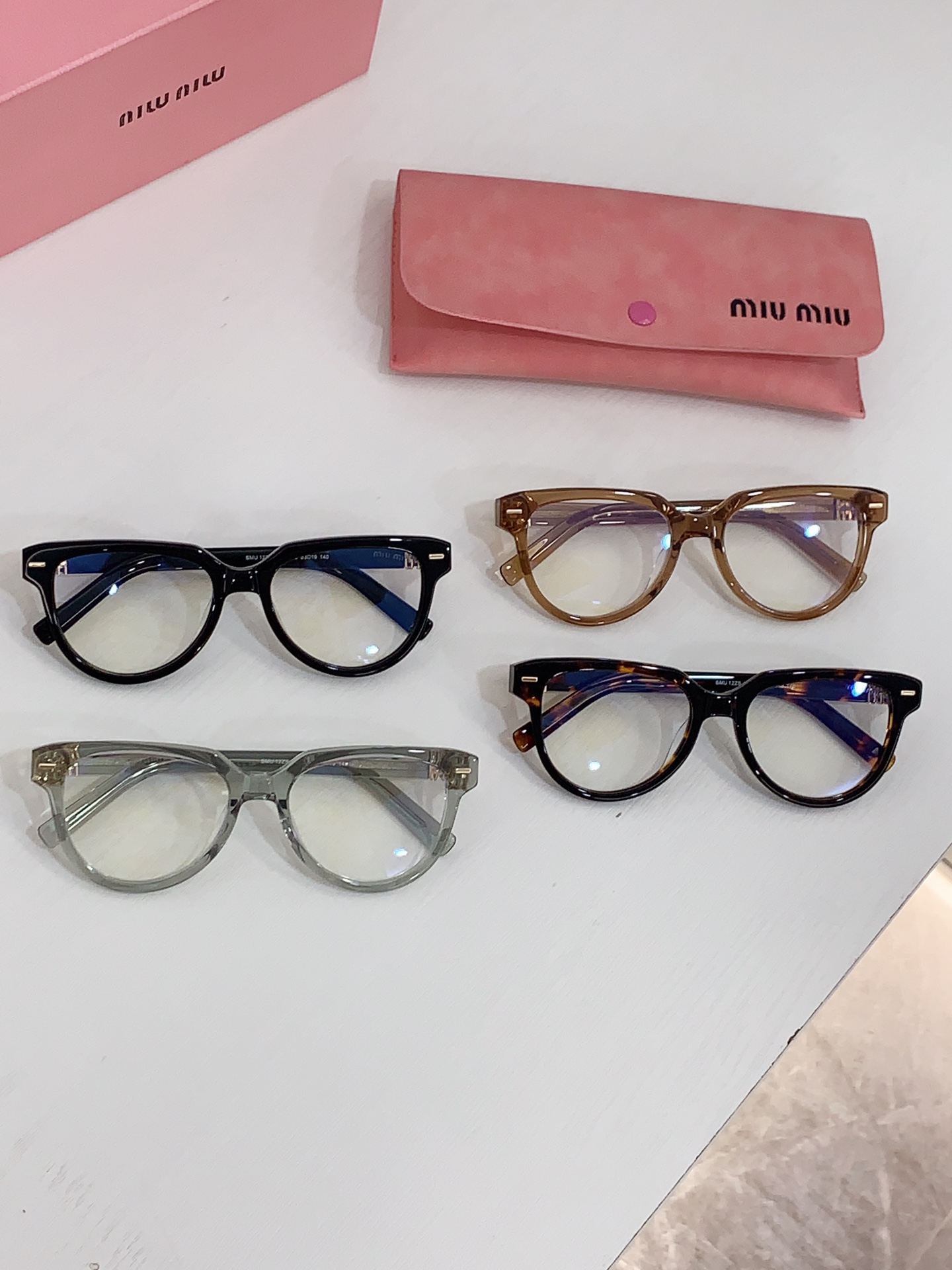 Miu Miu Sunglasses SMU12ZS SM011