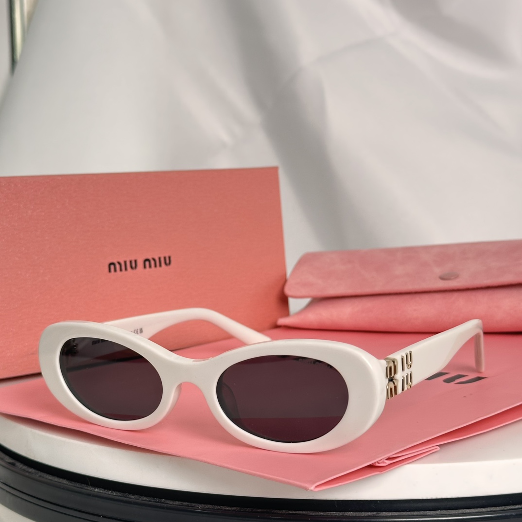 Miu Miu Sunglasses SMU06ZS SM021