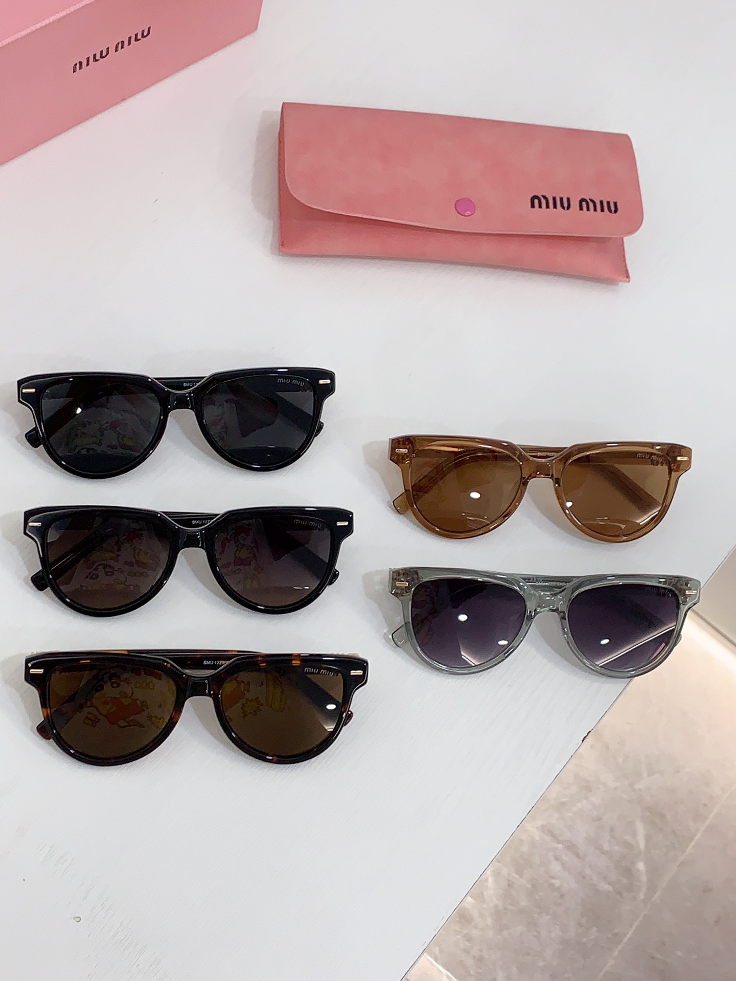 Miu Miu Sunglasses SMU12ZS SM021