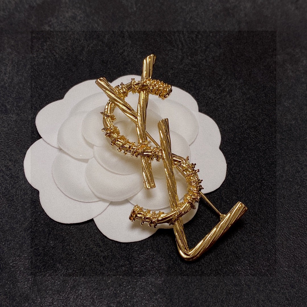 Saint Laurent Jewelry Brooches Spiral tattoo design