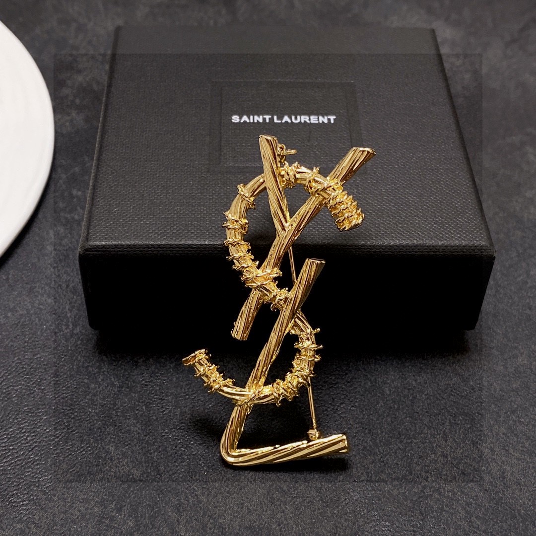 Saint Laurent Jewelry Brooches Spiral tattoo design