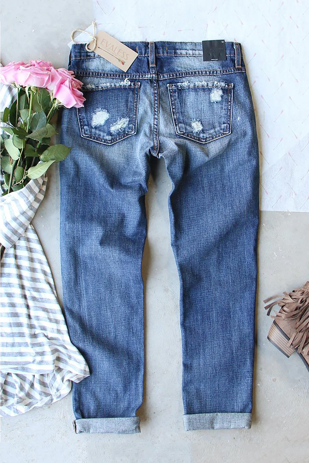 Clover Straight Ripped Jeans。