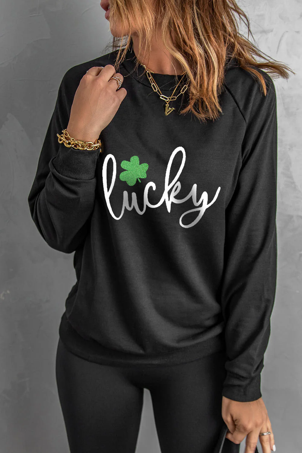 Clover Lucky Graphic Raglan Sleeve Sweatshirt.