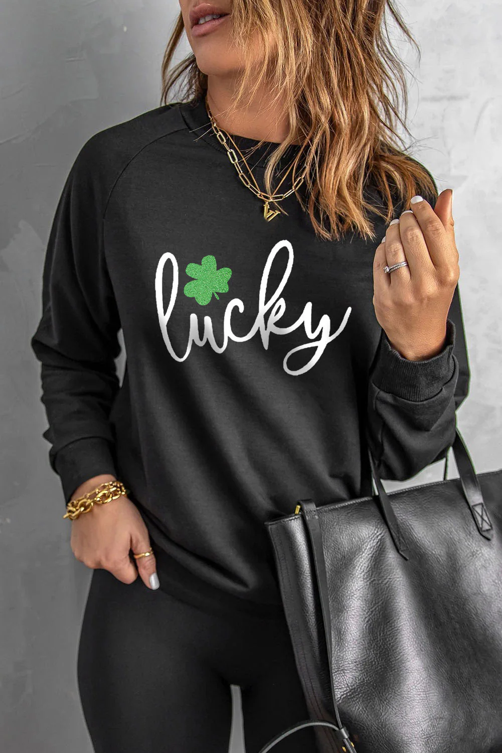 Clover Lucky Graphic Raglan Sleeve Sweatshirt.