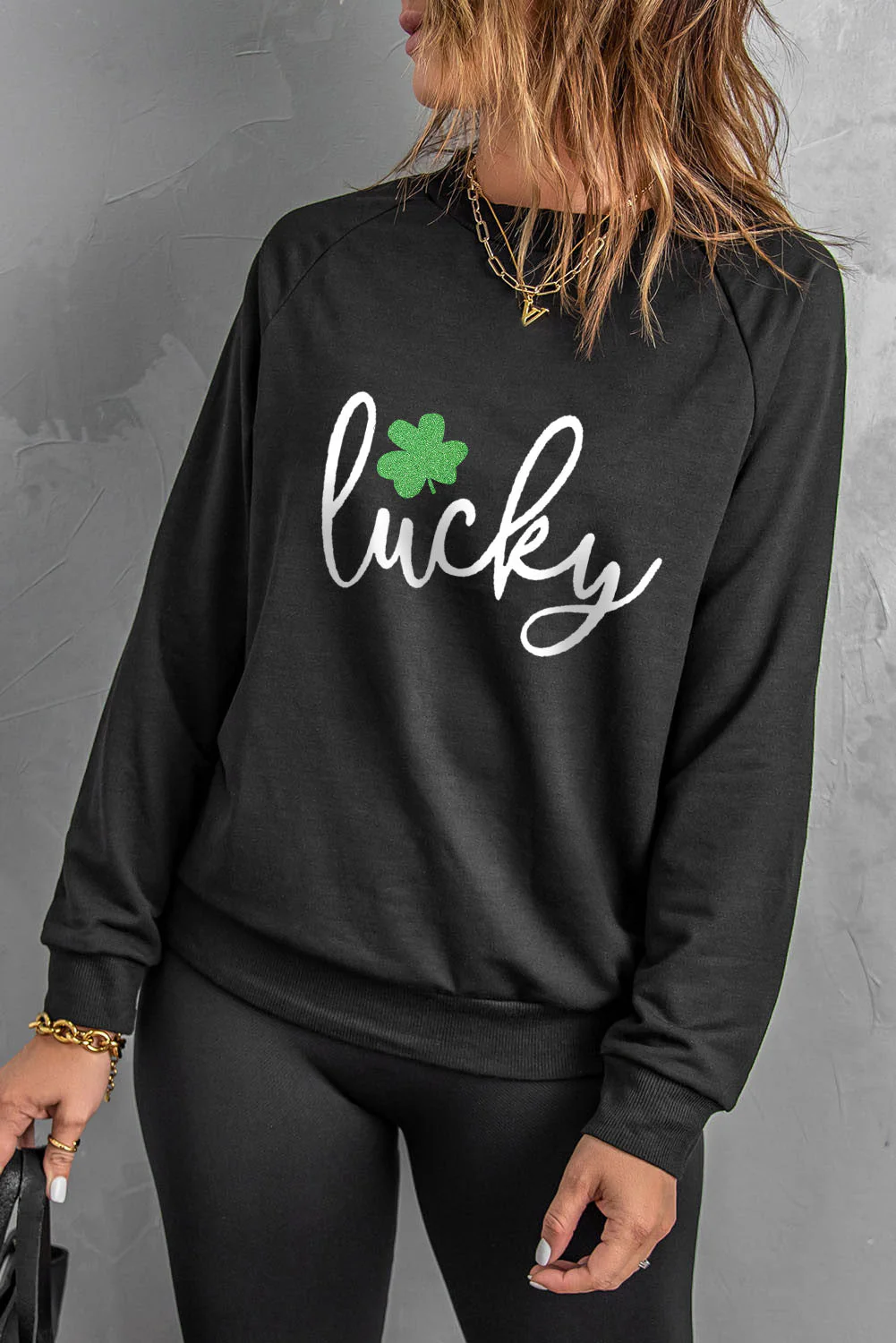 Clover Lucky Graphic Raglan Sleeve Sweatshirt.