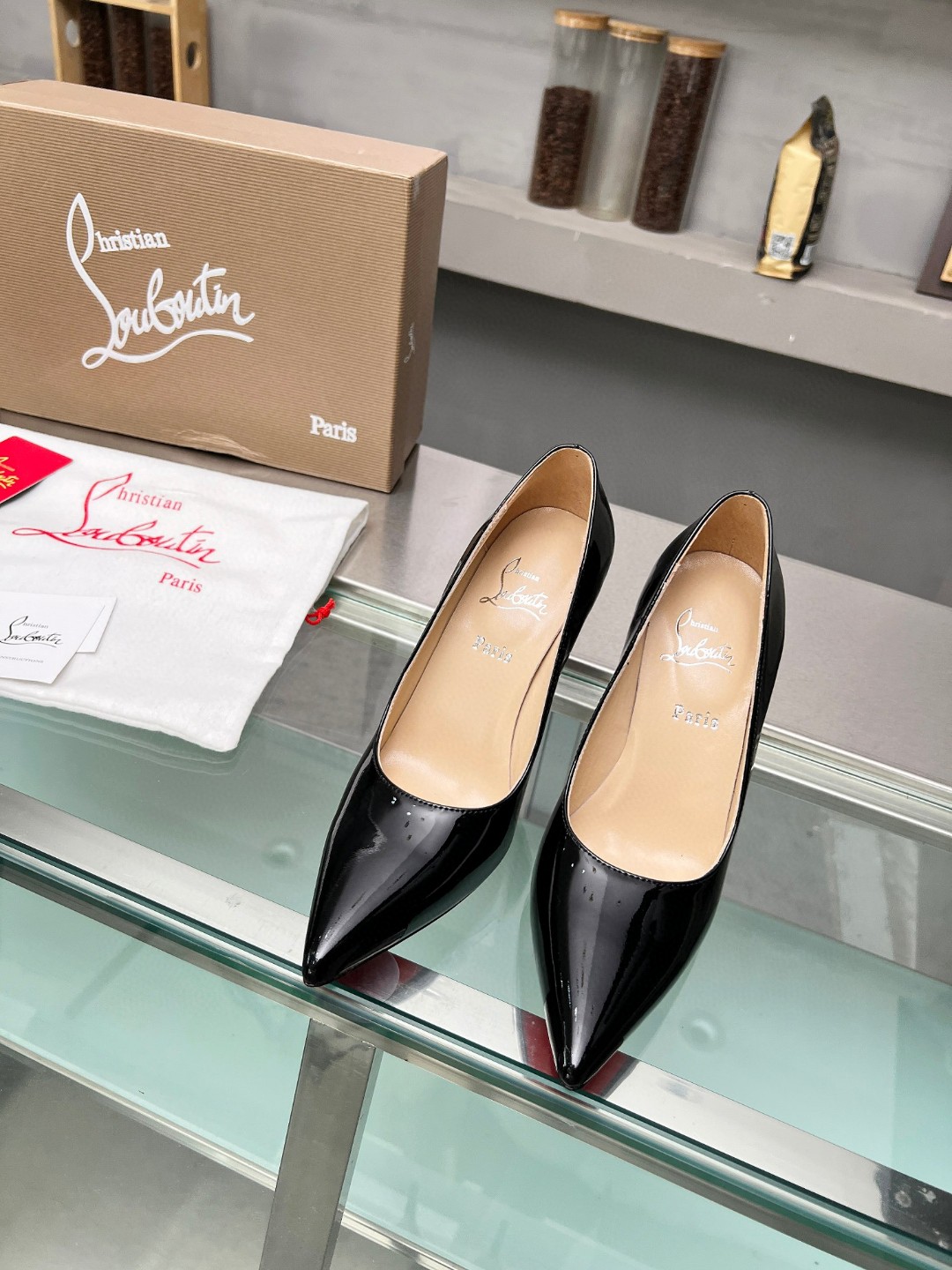 Christian Louboutin So Kate patent pumps